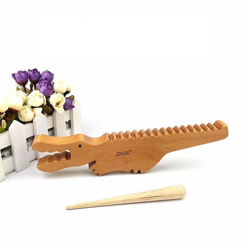 Wooden_alligator_music_toy._Sound_sensory_exploration_toy_alligator-music-toy-1