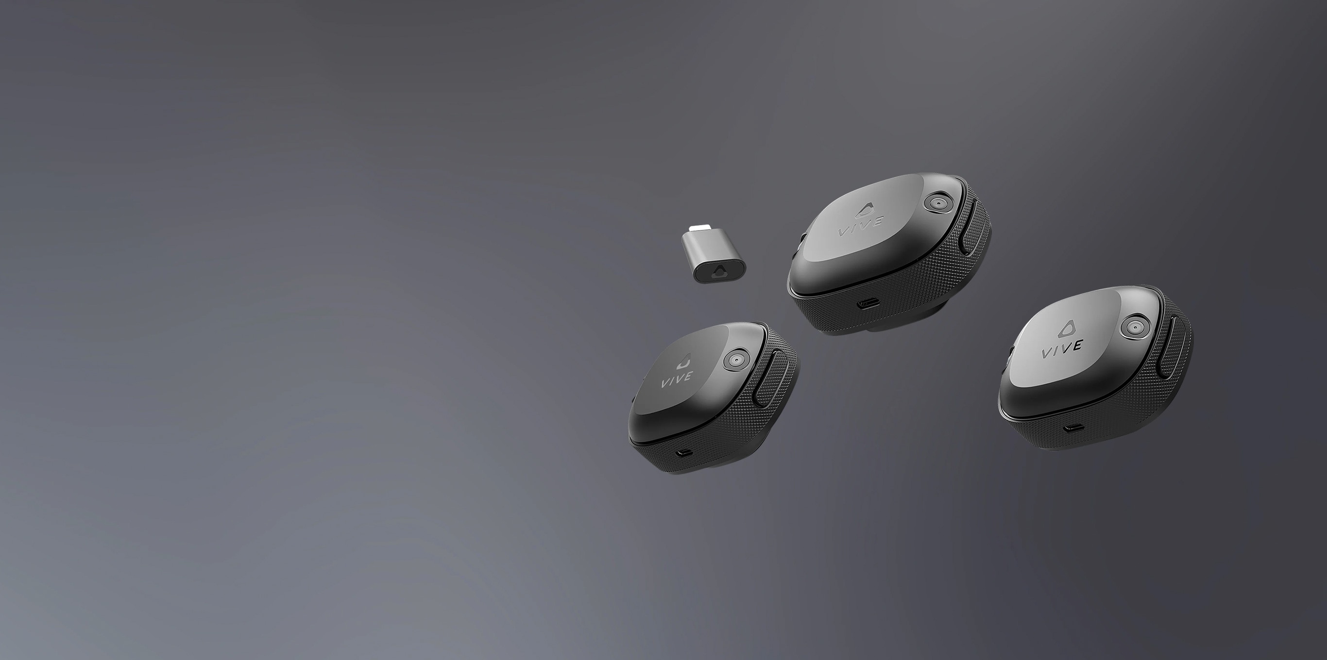 VIVE Ultimate Tracker 3+1 Kit featuring three VR trackers plus one wireless dongle for full-body tracking.